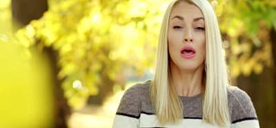 Woman Sneezing